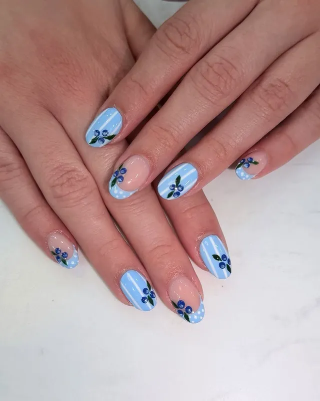 Blue gingham gel nails with hand-painted blueberries