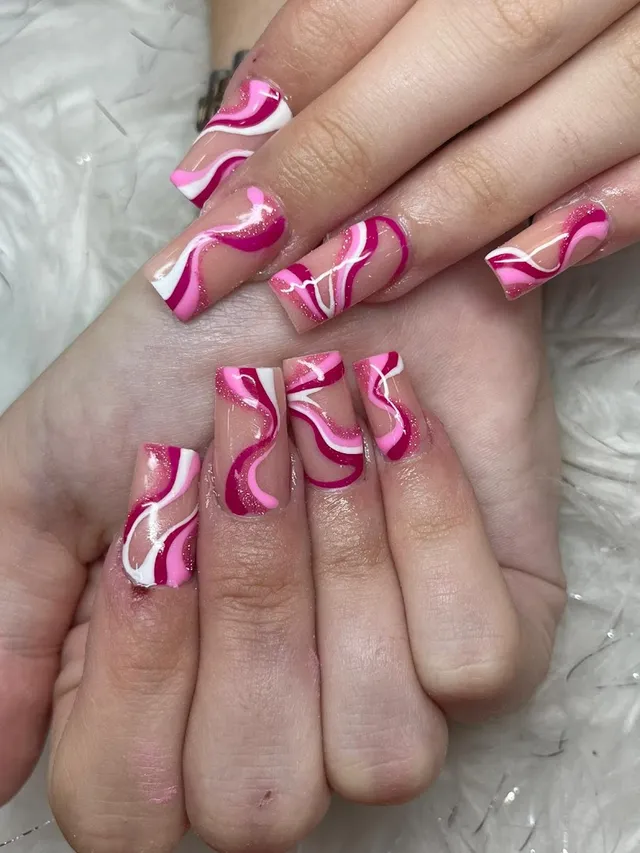 Pink and white swirl French nails with glitter